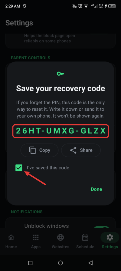 Save your recovery code dialog with the code, Copy and Share buttons, and the I’ve saved this code tick box