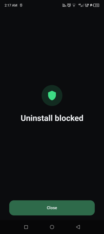 The Uninstall blocked page shown over the uninstall dialog